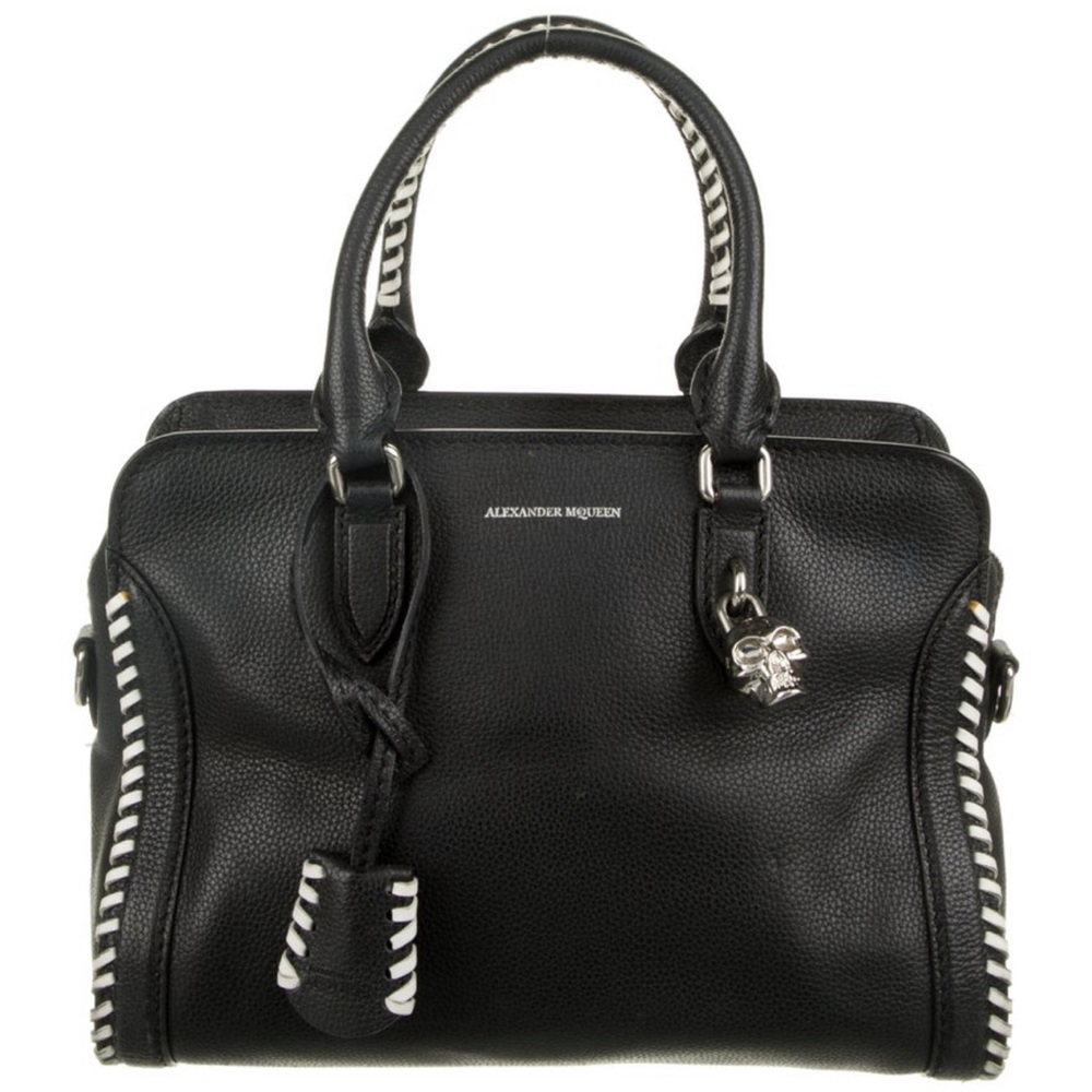 Alexander McQueen
Handle Drop: 5.5"
Height: 8"
Width: 12"
Depth: 7"